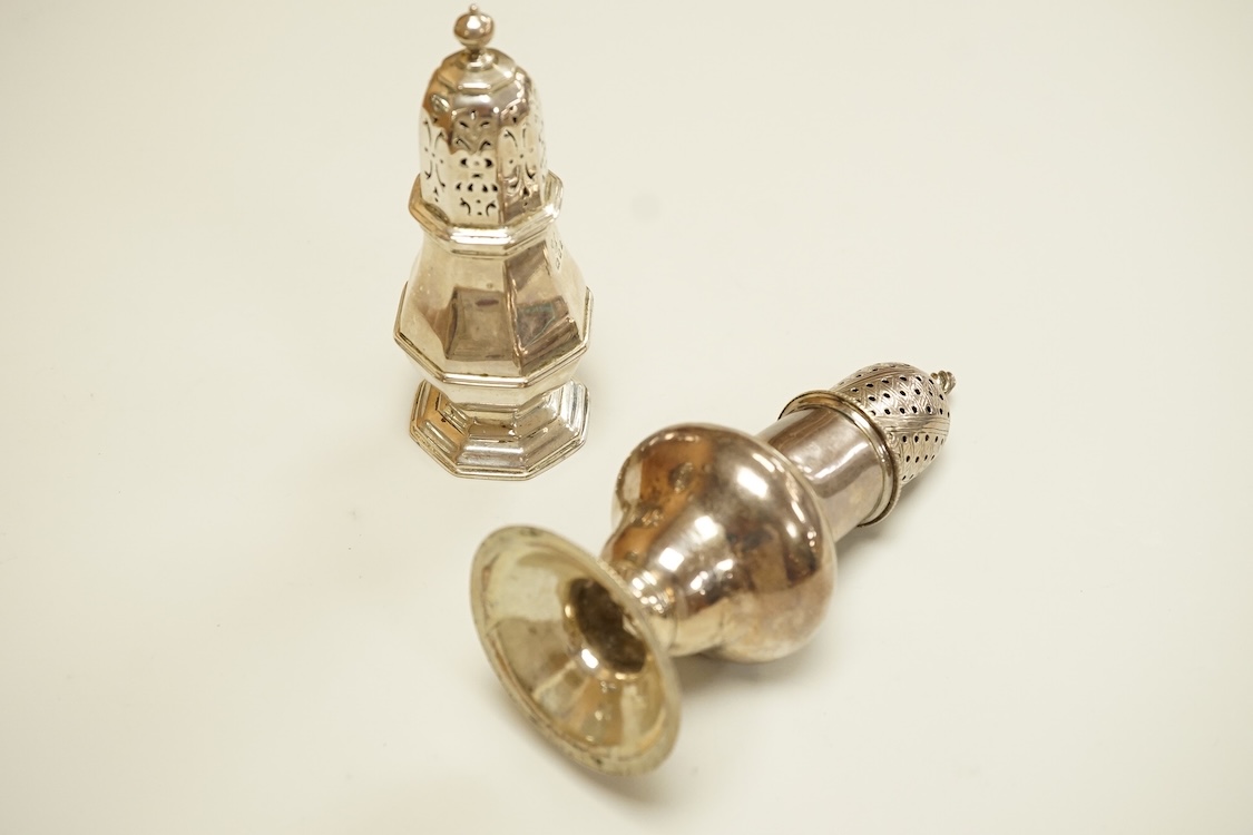 A George II silver pepperette, possibly by Joseph Sanders, London, 1739, 13cm, together with a George V silver pepperette.